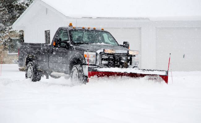 Truck plowing snow